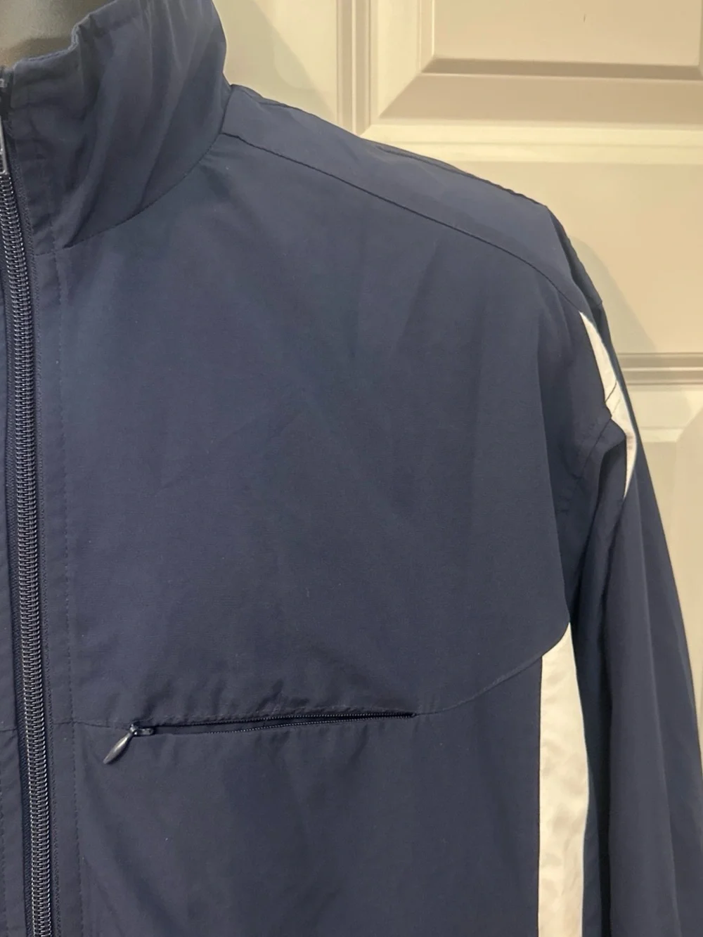 Vintage 1990’s Nike Men’s Navy Track Jacket with White Accents